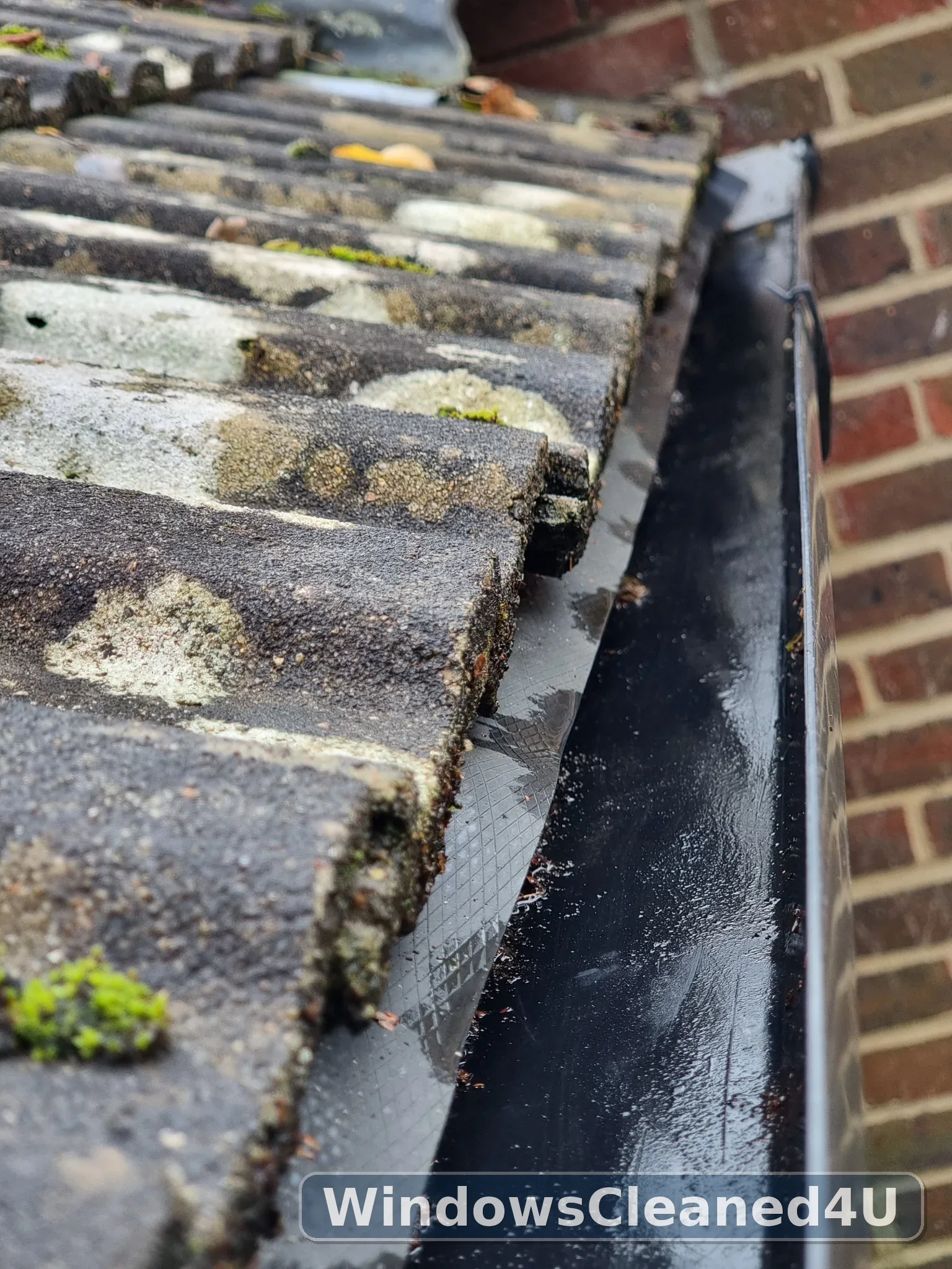 The same gutter after the leaves and debris were removed